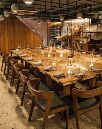 Elegant dining table in The Larder Room, perfect for corporate dinners and networking events.