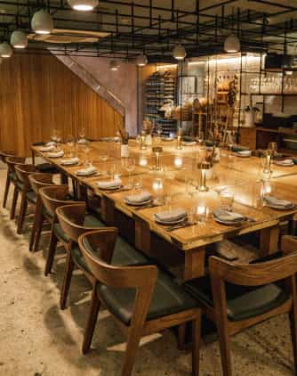 Elegant dining table in The Larder Room, perfect for corporate dinners and networking events.