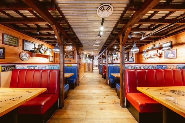 Vibrant rustic dining space in The Beaufort Room, perfect for casual gatherings and events.