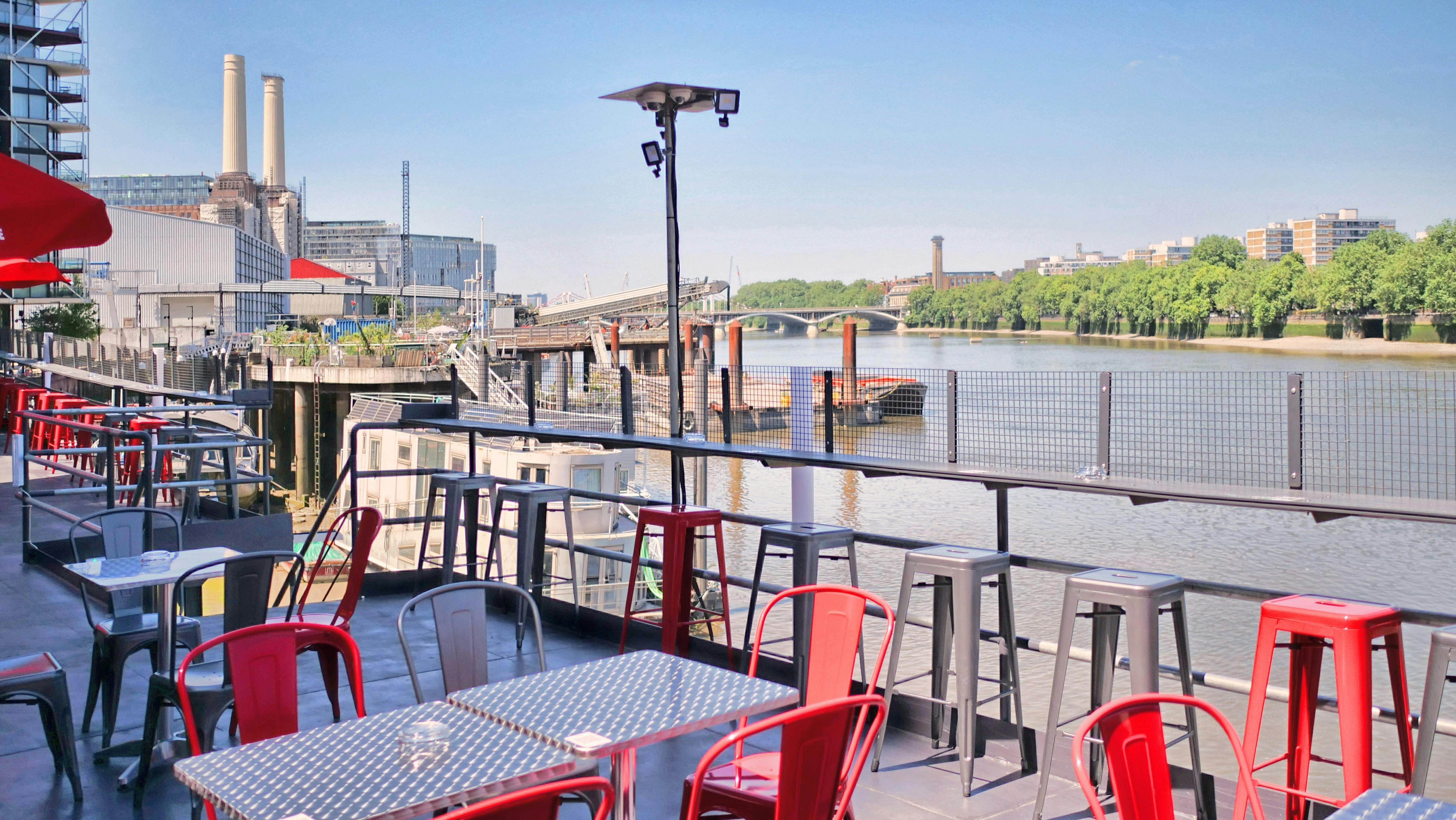 Vibrant outdoor venue at Battersea Barge, ideal for summer networking events.