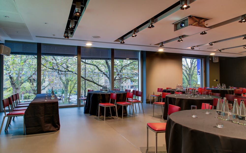 Dorfman Room at Sadler's Wells: versatile event space with natural light for meetings and gatherings.