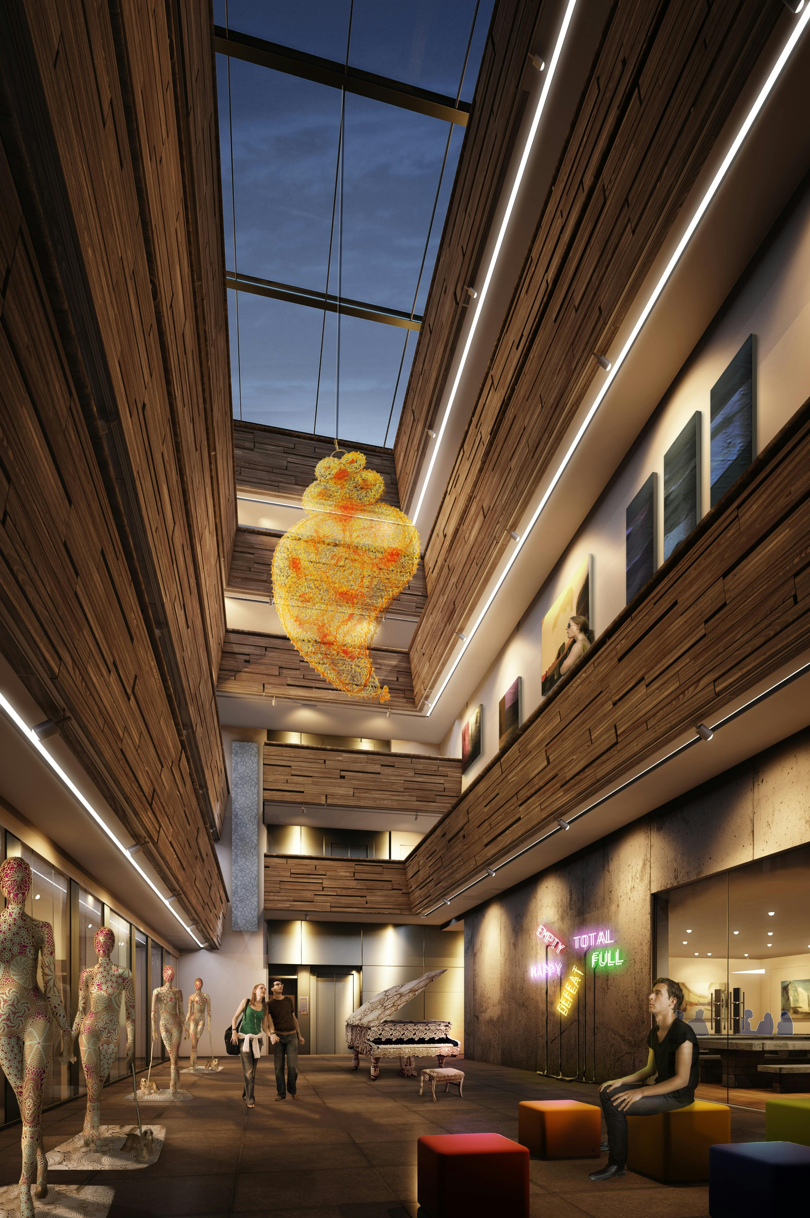 Modern event space in Arthaus Atrium with artistic chandelier, ideal for receptions and networking.