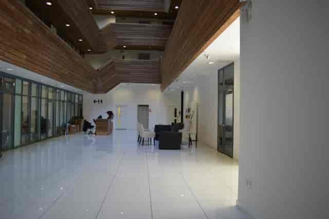 Modern Arthaus Atrium venue with sleek white floors, ideal for networking events.