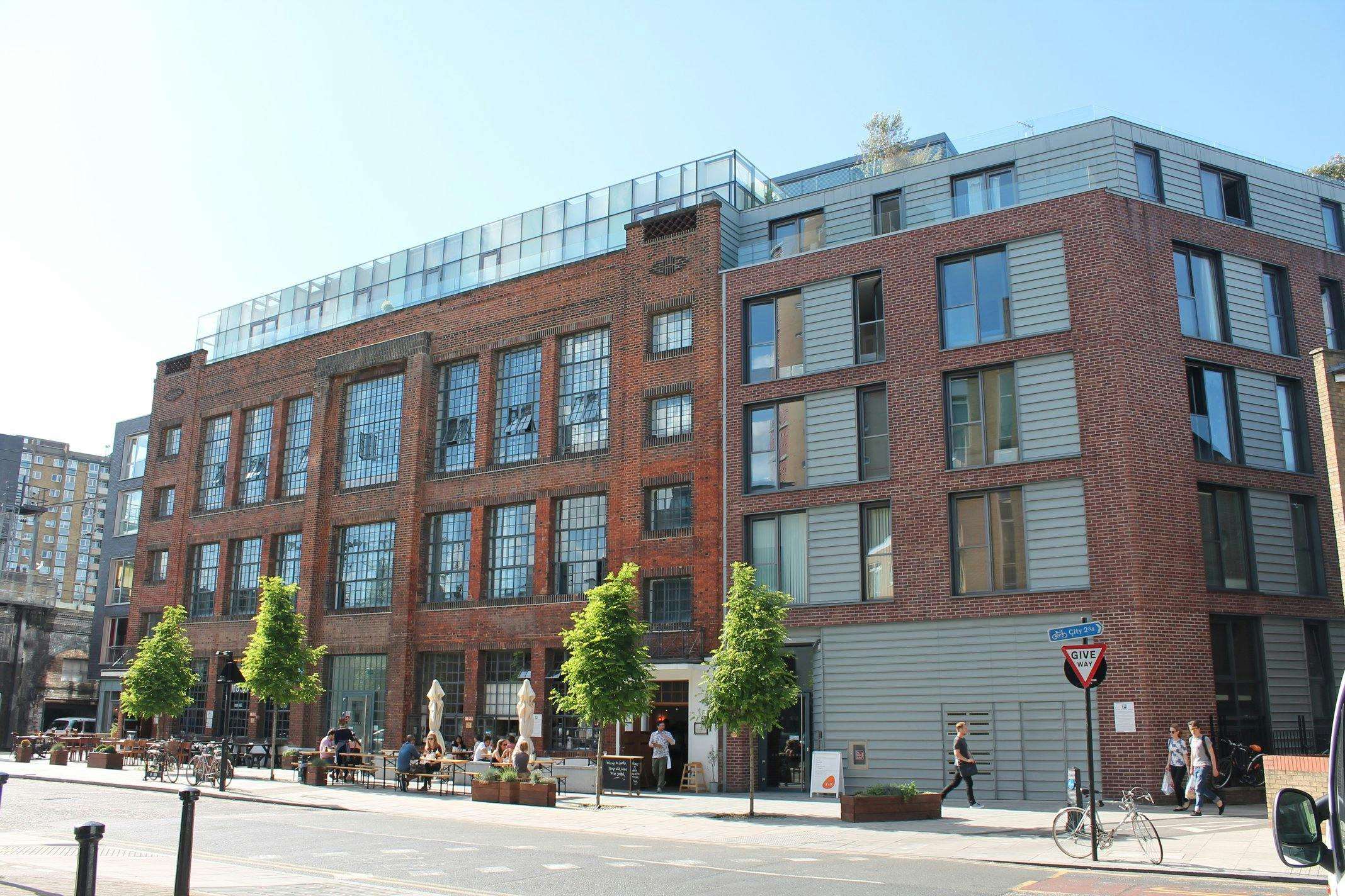 Modern Arthaus Atrium venue with brick architecture, ideal for events and gatherings.