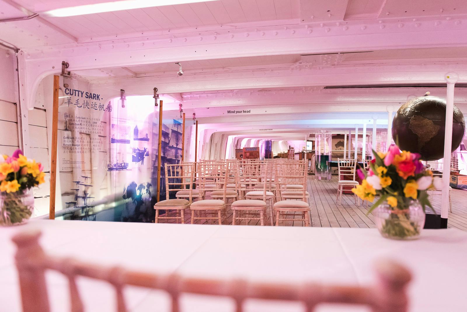 Elegant Tween Deck event space on Cutty Sark, perfect for ceremonies and presentations.