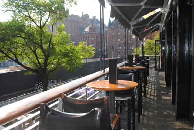 On Bar outdoor high-top breakout area for corporate networking and cocktail events.