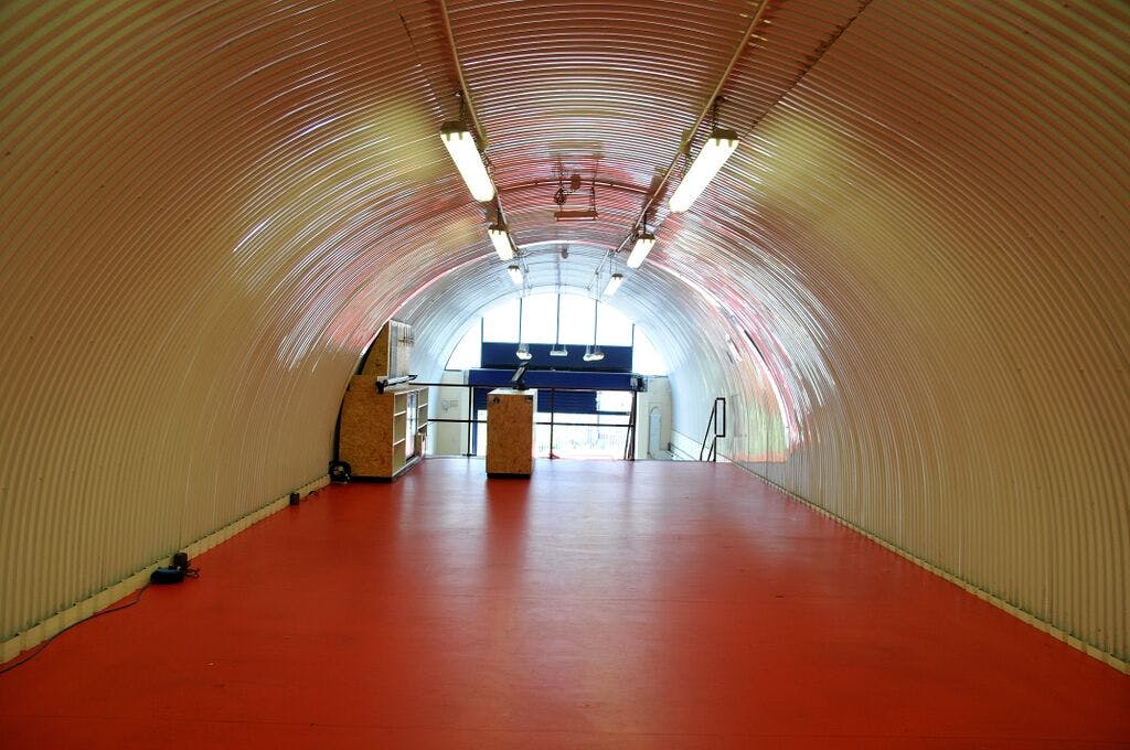 Spacious curved corridor in The Bottle Shop SE1, perfect for creative events and exhibitions.