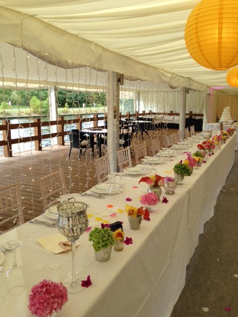 Elegant dining setup at The Marquee, Ravens Ait Island for weddings and events.