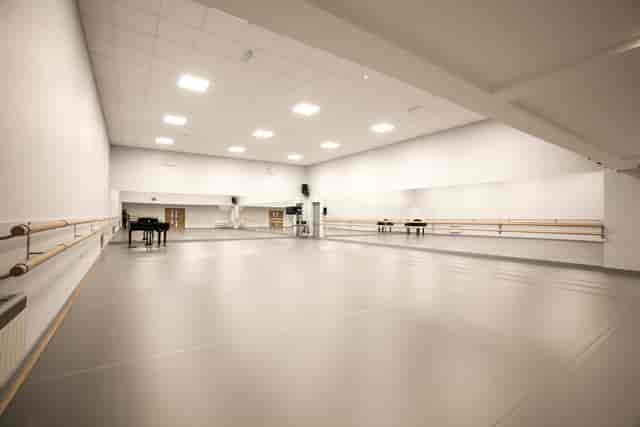 Spacious dance studio with mirrored walls for classes and workshops at Adagio School of Dance.