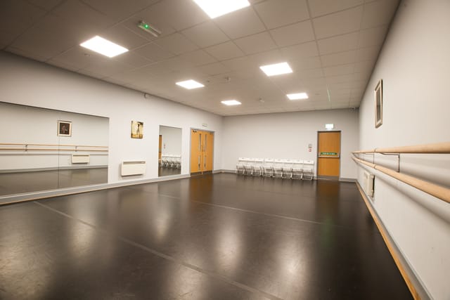 Versatile event space with mirrored walls for workshops and meetings at Adagio School of Dance.
