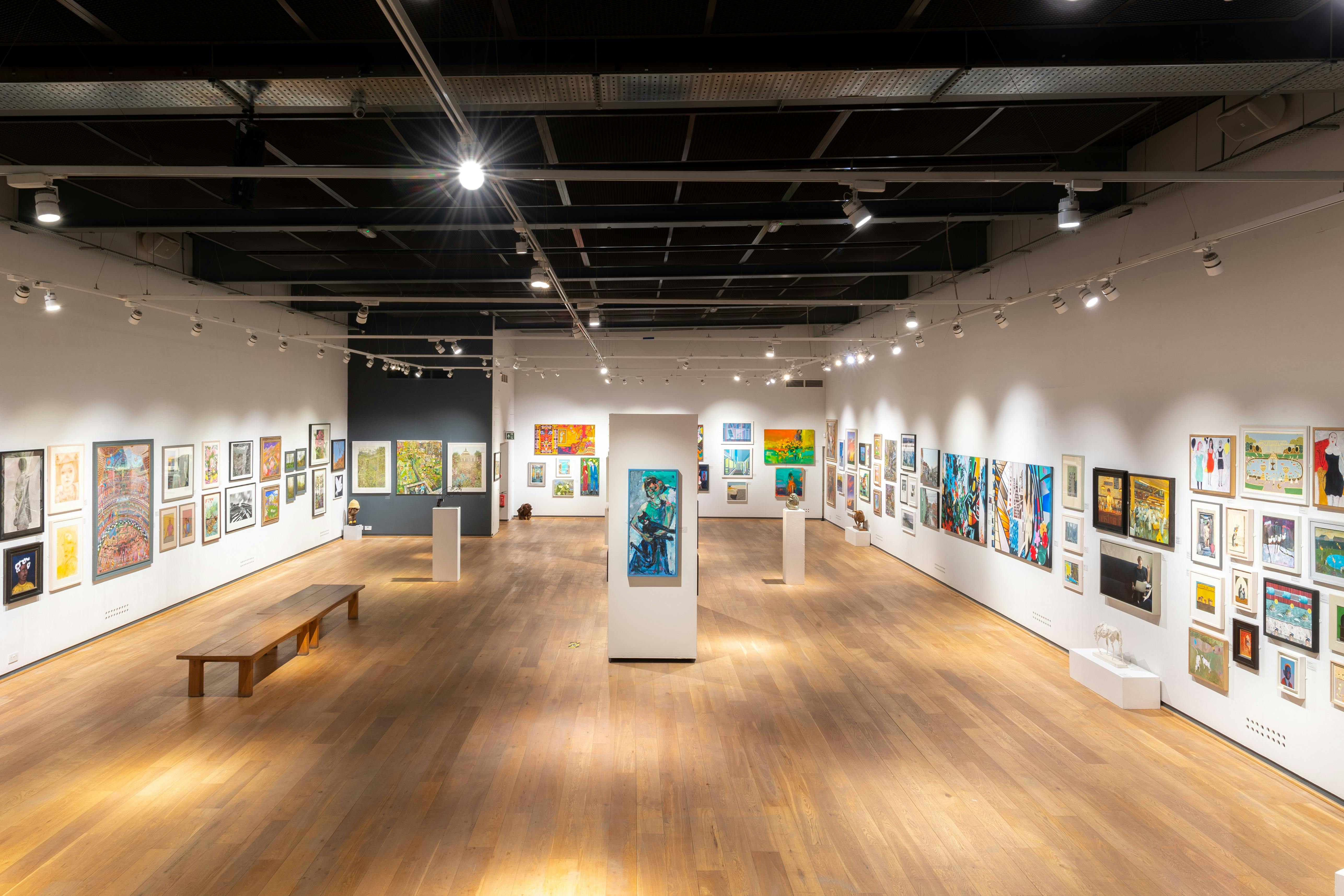 Spacious West Gallery at Mall Galleries, ideal for art events and networking.