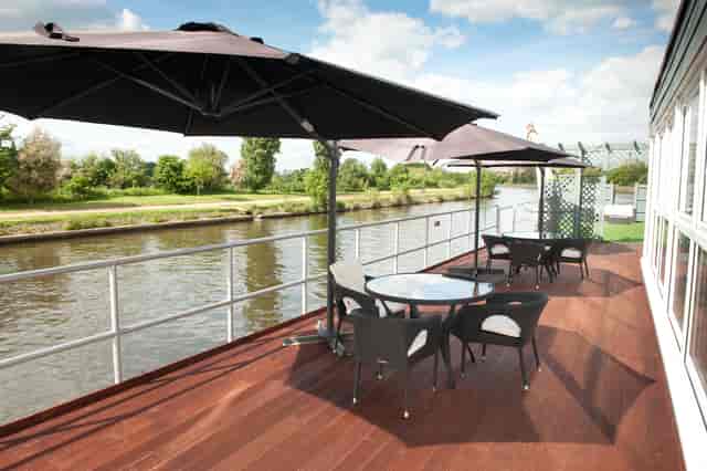 Outdoor meeting space at The Britannia Suite, Ravens Ait Island, ideal for networking events.