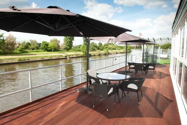 Outdoor meeting space at The Britannia Suite, Ravens Ait Island, ideal for networking events.