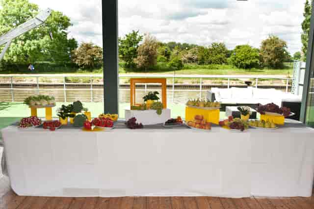 Alt text: Refreshment table with fresh fruits in The Britannia Suite, ideal for outdoor events.