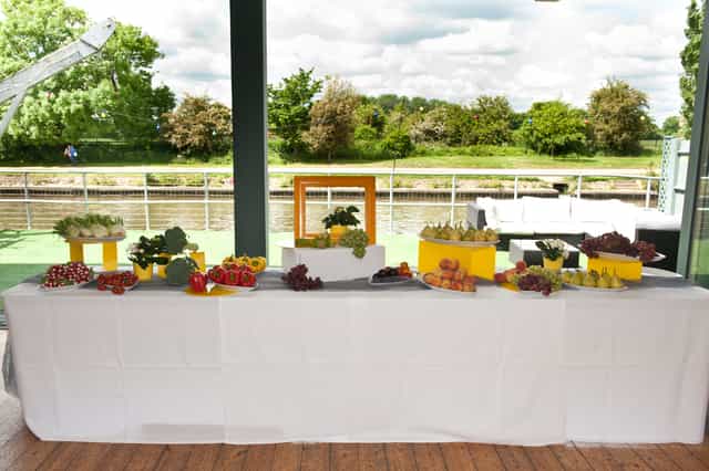 Alt text: Refreshment table with fresh fruits in The Britannia Suite, ideal for outdoor events.