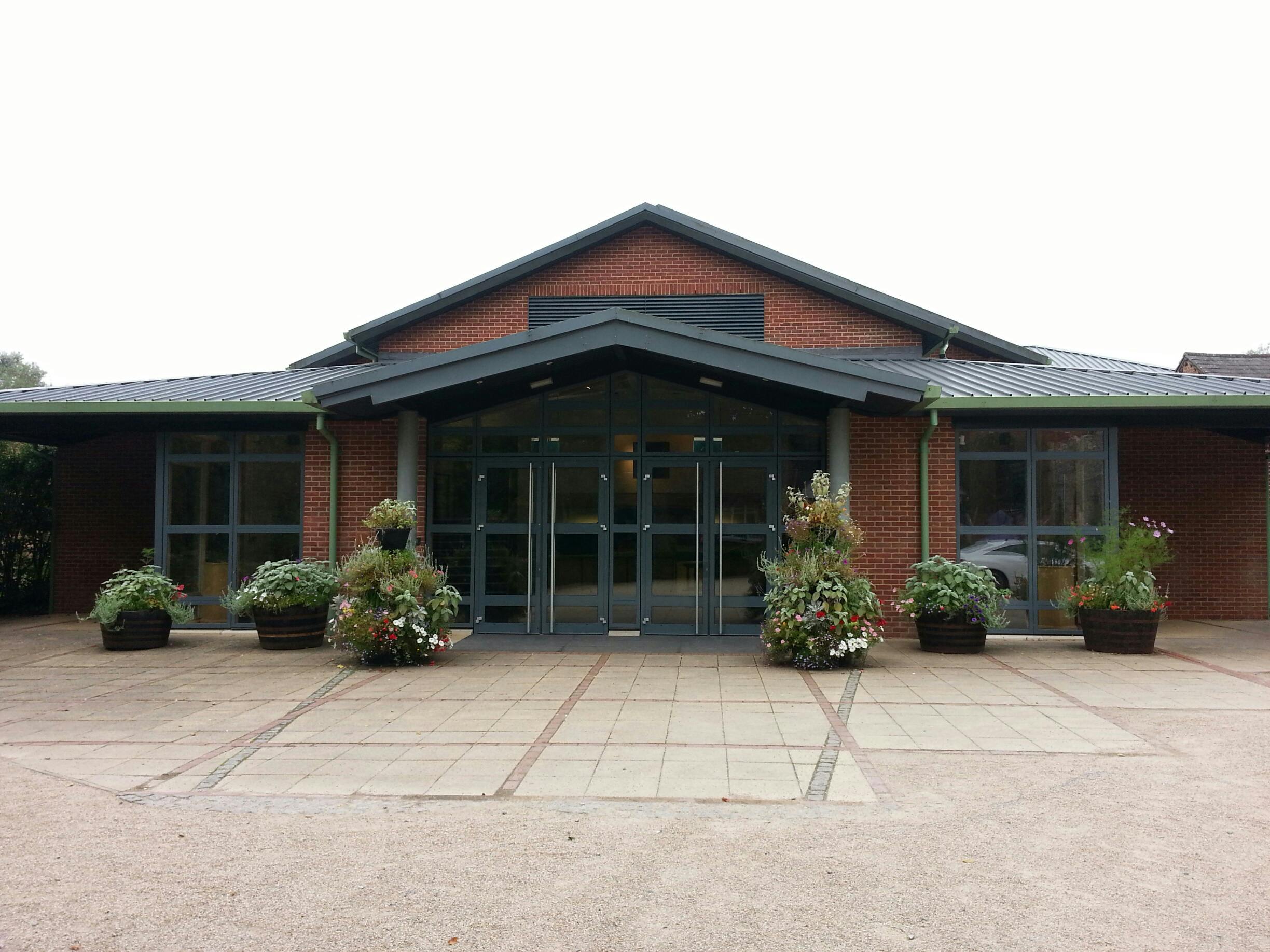 Ellis Theatre entrance at Marlborough College, ideal for events with spacious glass doors.