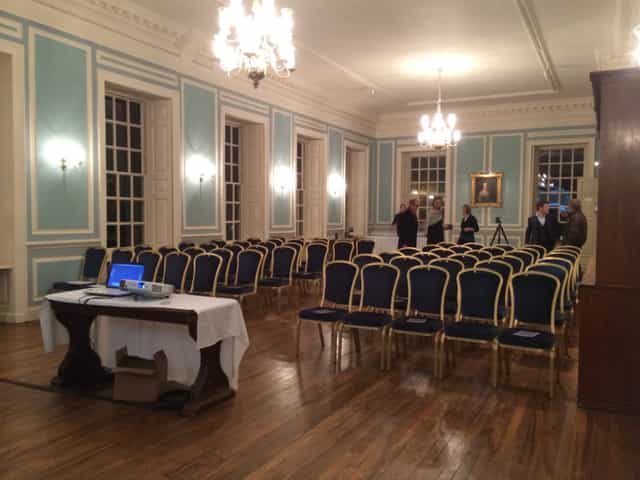 Meeting room at The Adderley, Marlborough College, with blue chairs for events and presentations.