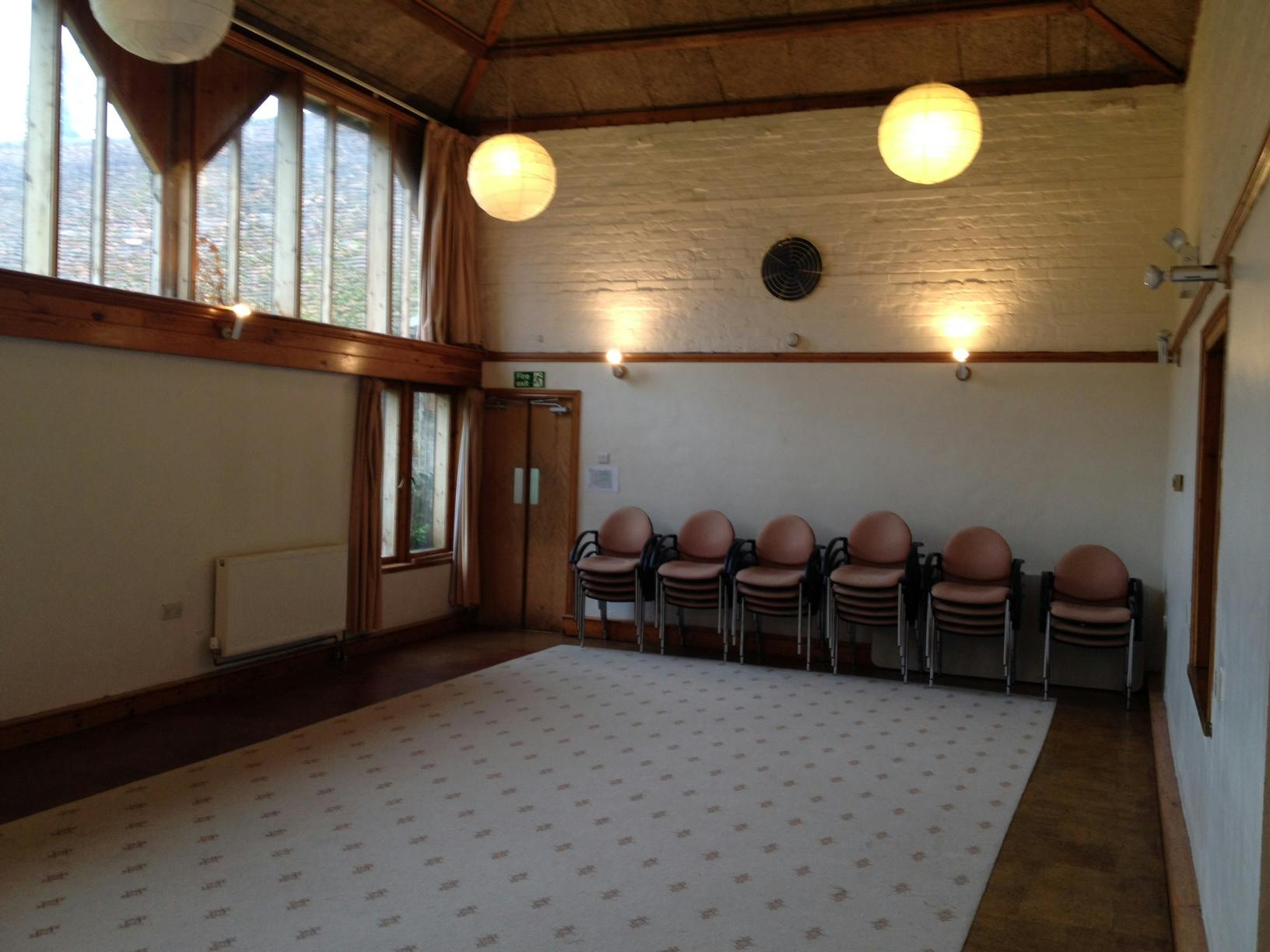 Great Hall at Inner Wealth Retreat, bright meeting space for workshops and gatherings.