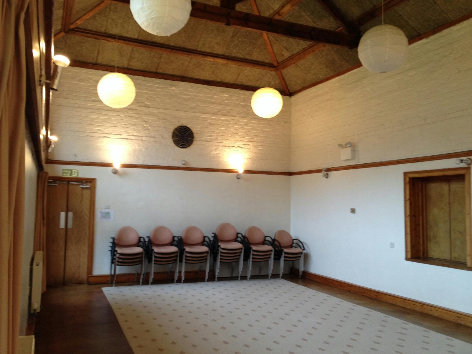 Great Hall at Inner Wealth Retreat, high ceiling, ideal for meetings and workshops.