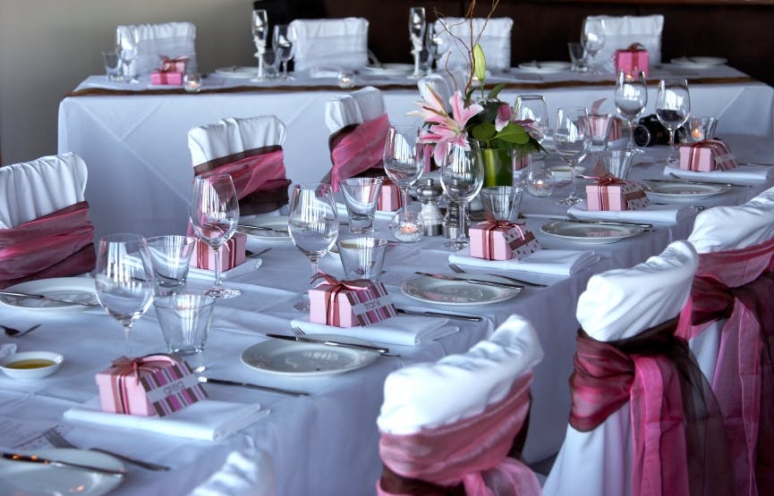Elegant dining table with fresh flowers for weddings and formal events at Frogmore Suite.