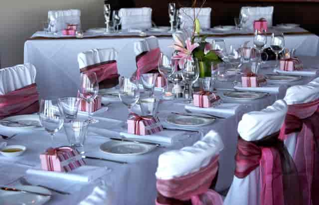 Elegant dining table with fresh flowers for weddings and formal events at Frogmore Suite.