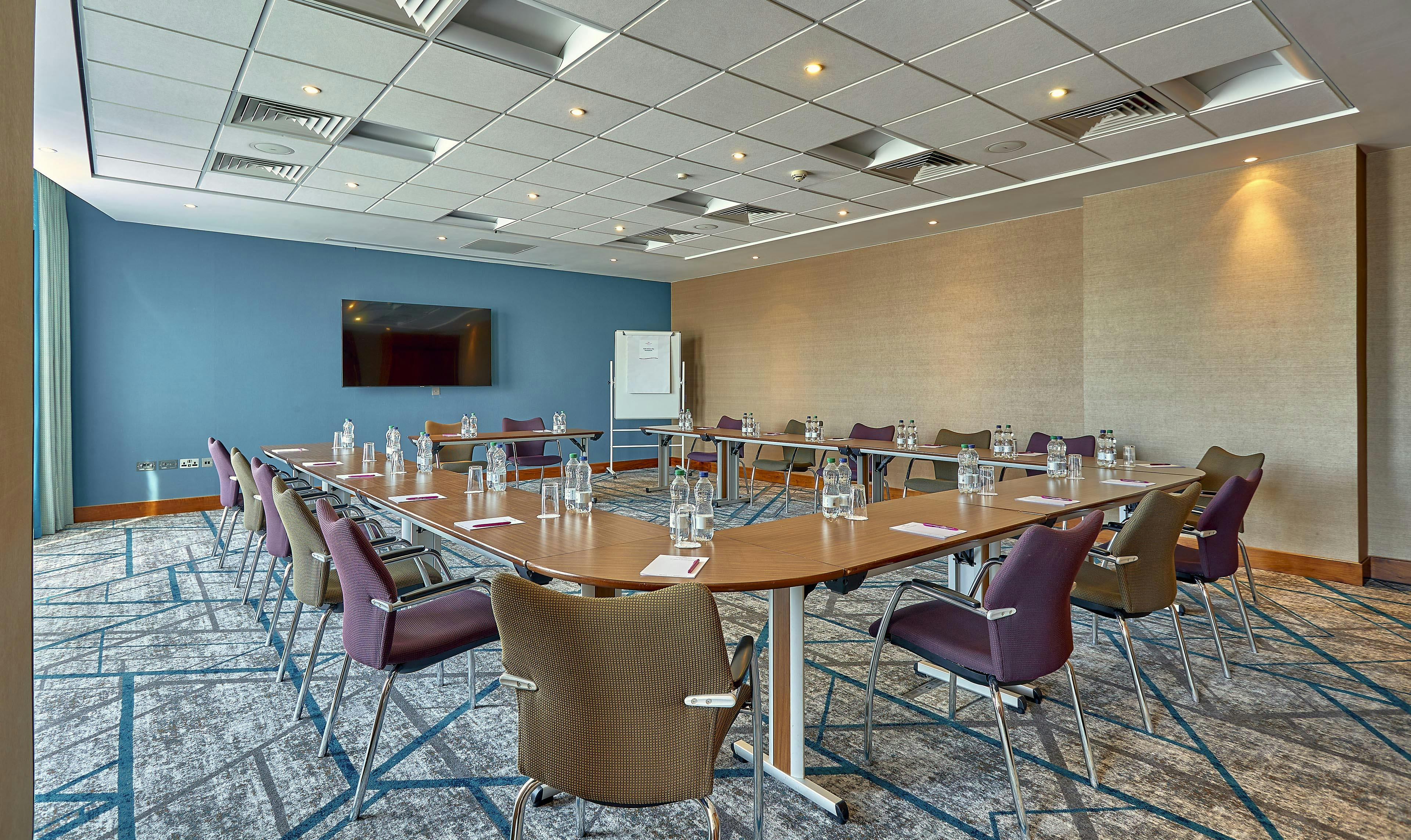 Frogmore Suite meeting room with U-shaped table, ideal for corporate events and gatherings.