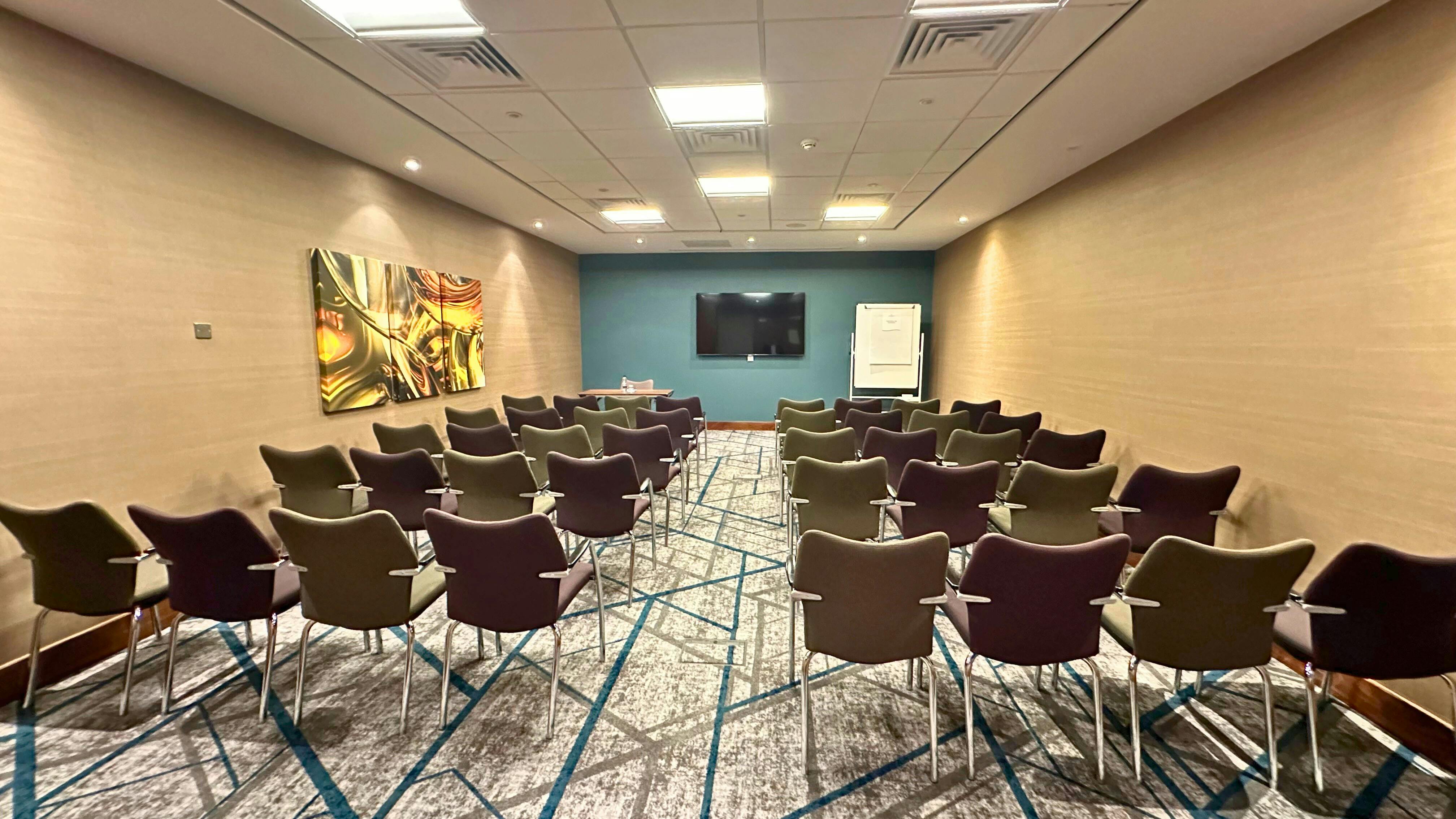 Meeting room at Crowne Plaza Reading East, featuring modern decor for corporate events.