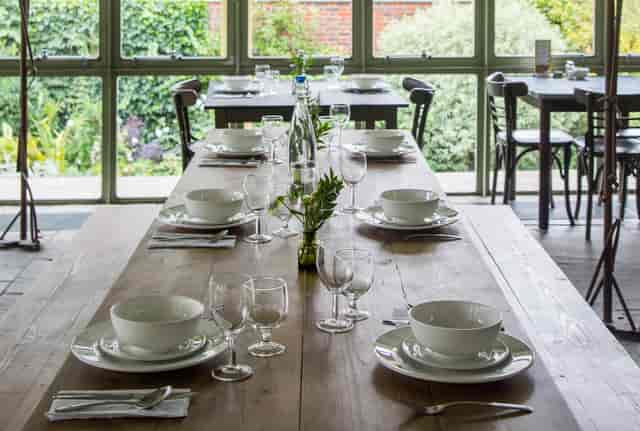 Elegant dining table in Garden Atrium, perfect for corporate dinners or intimate gatherings.