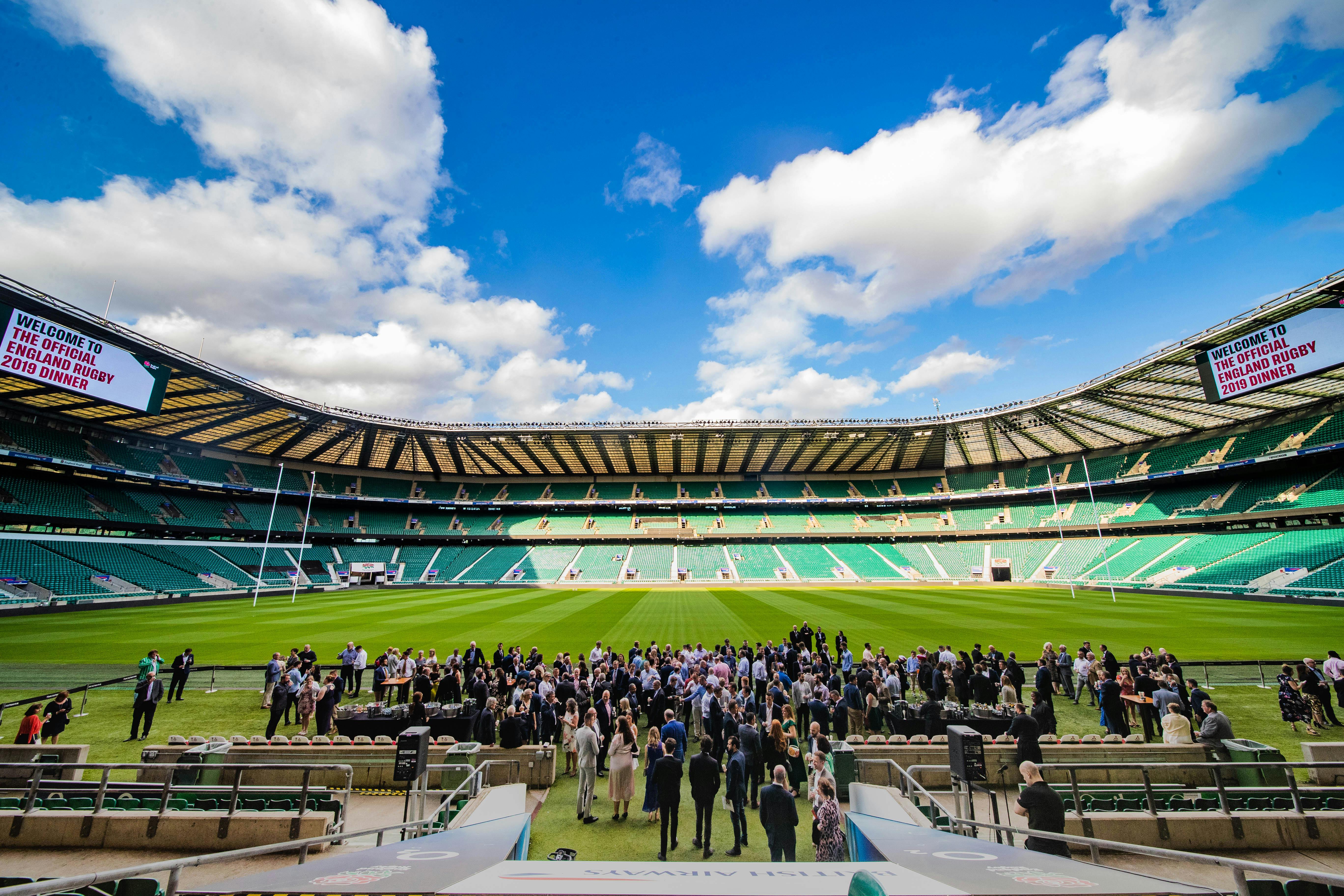 Allianz Stadium Players' Tunnel with vibrant event, green field, corporate gatherings.