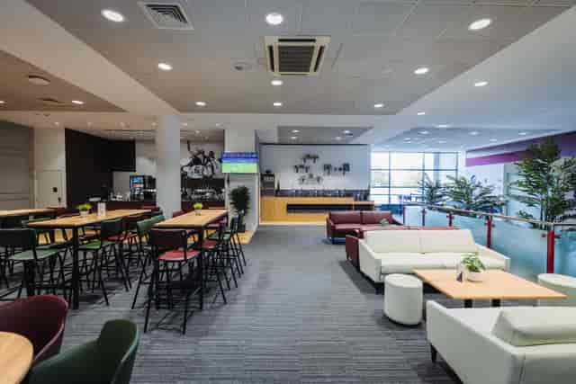Beaumont breakout area at Allianz Stadium with collaborative seating for event networking.