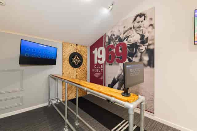 Beaumont corporate breakout space with interactive gaming at Allianz Stadium for networking events.