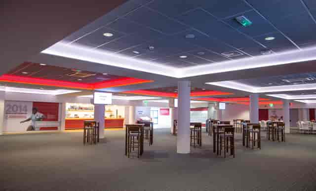 Captains Club at Allianz Stadium: modern event space with high-top tables for receptions.