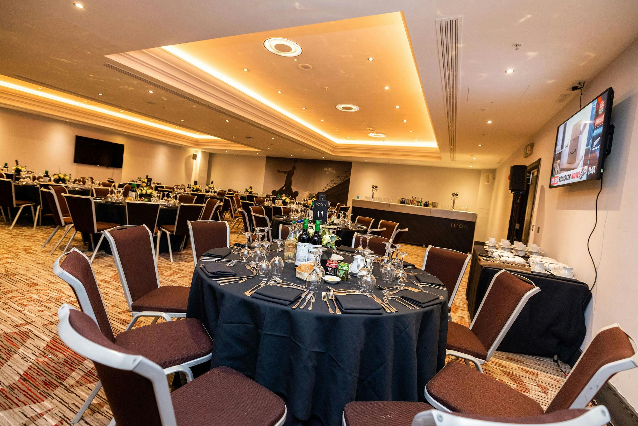 Shakespeare Suite at Allianz Stadium, elegant dinner setup for corporate events.