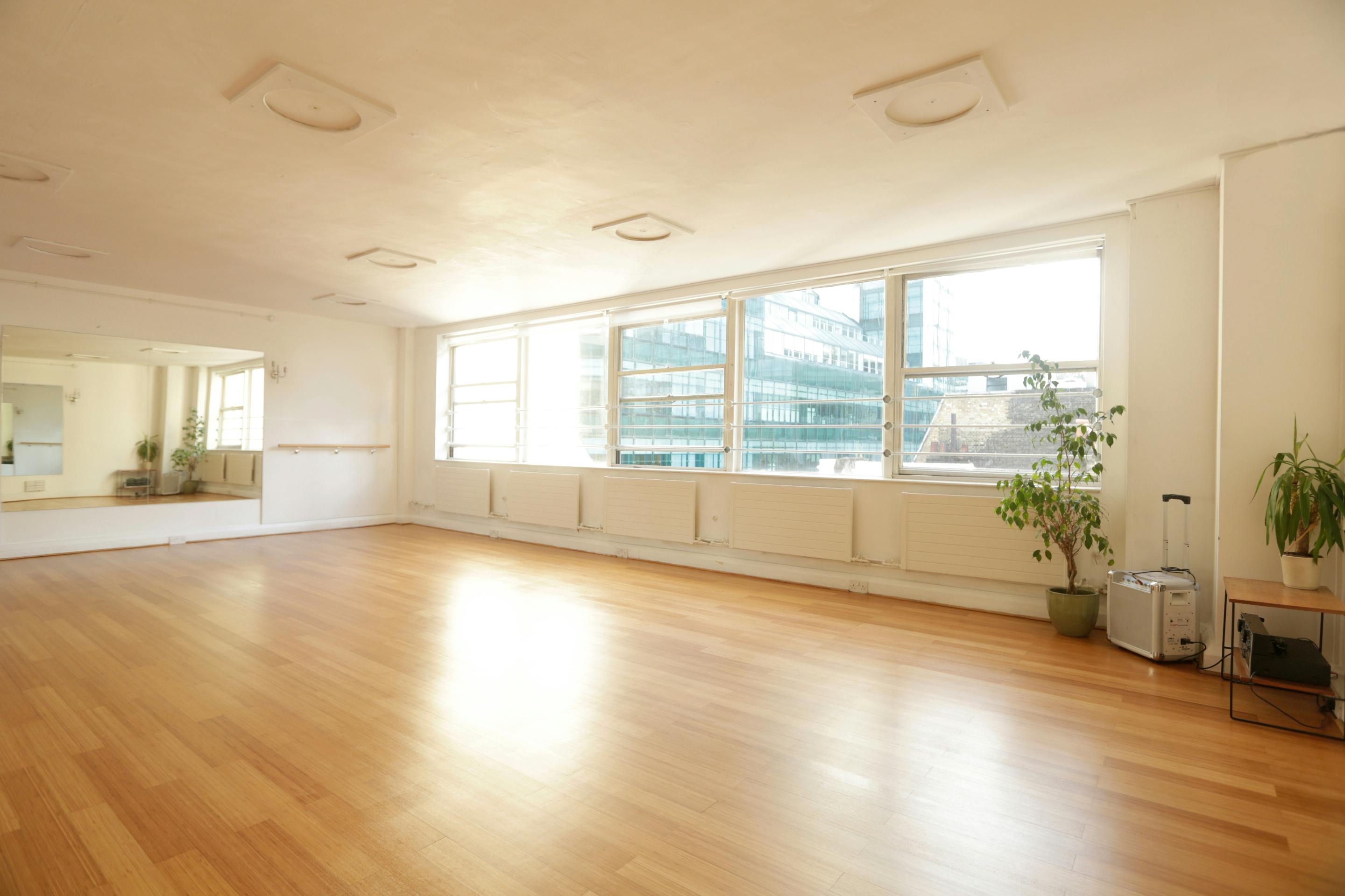 Spacious London rehearsal studio with natural light, ideal for workshops and events.