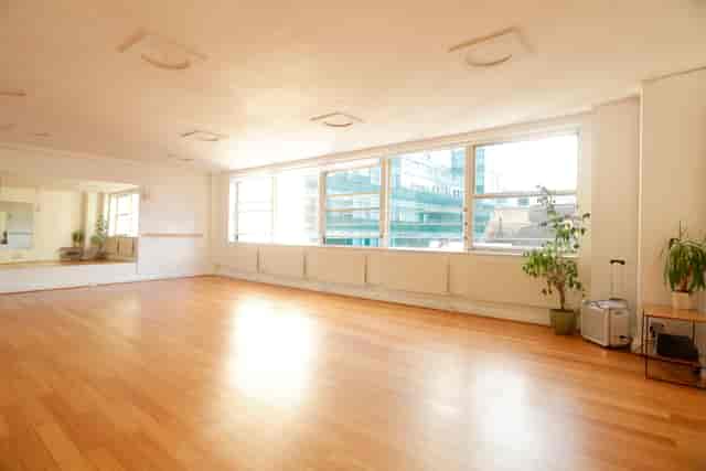 Spacious London rehearsal studio with natural light, ideal for workshops and events.