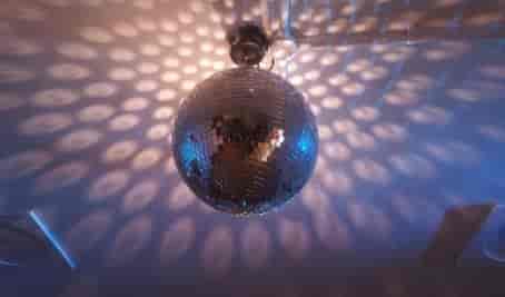 Disco ball in London rehearsal space, ideal for dance parties and events.