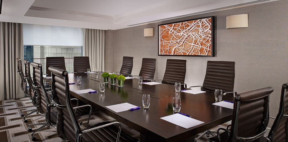 Modern Hyatt Regency Birmingham boardroom with ergonomic chairs for meetings.