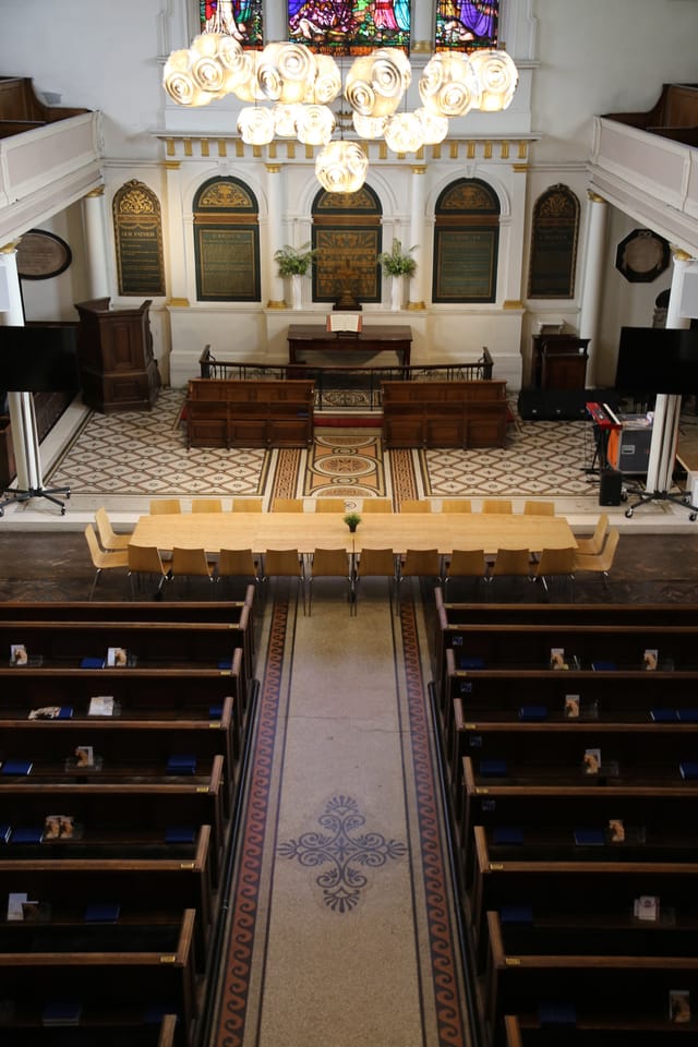 Elegant meeting space in The Church Crypt, ideal for workshops and discussions.