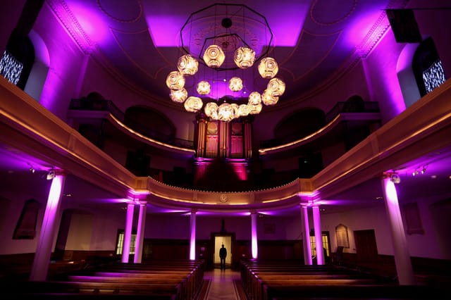 Elegant event space with purple lighting at The Church in The Crypt, perfect for weddings.