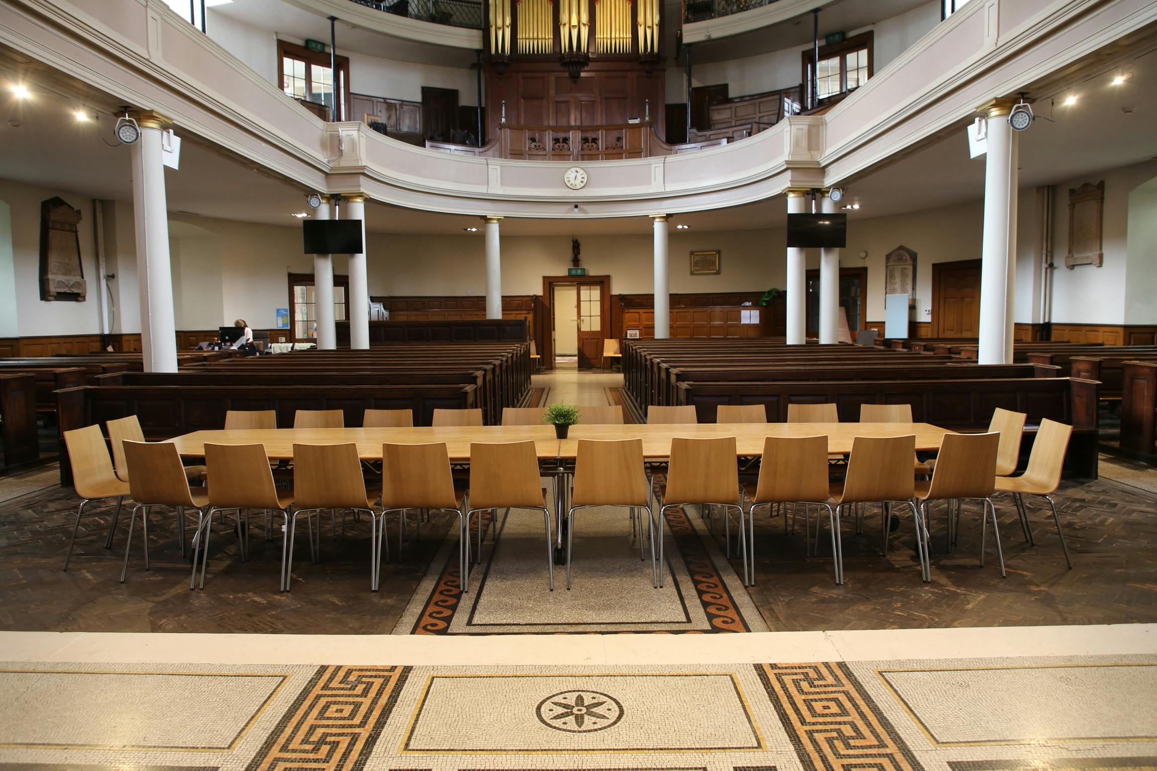 Versatile meeting space in The Church in The Crypt, ideal for corporate events and workshops.