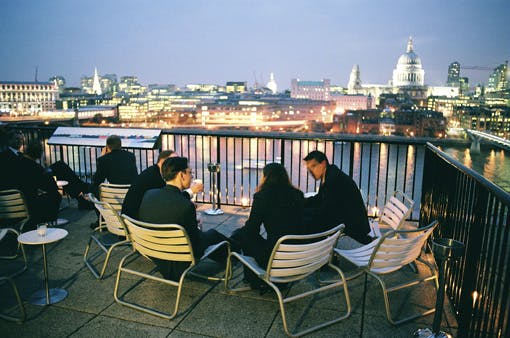 Stylish rooftop venue at Tate Modern with city skyline, ideal for networking events.