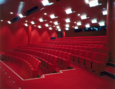 Starr Cinema at Tate Modern with vibrant red seating, ideal for presentations and performances.