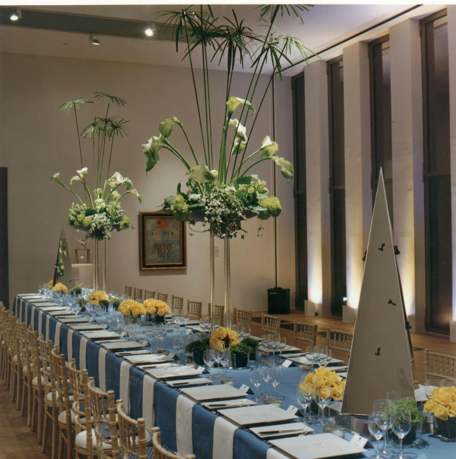 Elegant banquet table with floral centerpieces at Tate Modern for corporate events.