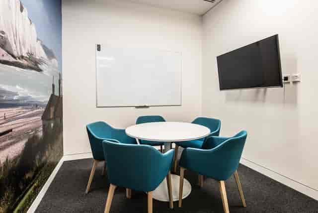 Louis Bleriot huddle room with whiteboard for agile brainstorming and small-group collaboration.