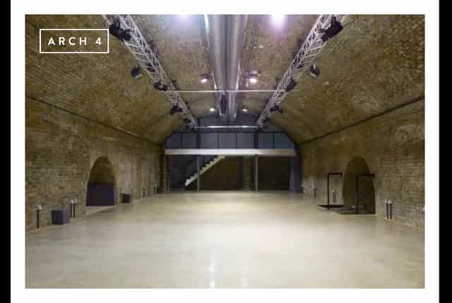 Spacious Arch 4 venue with exposed brick, ideal for conferences and exhibitions.