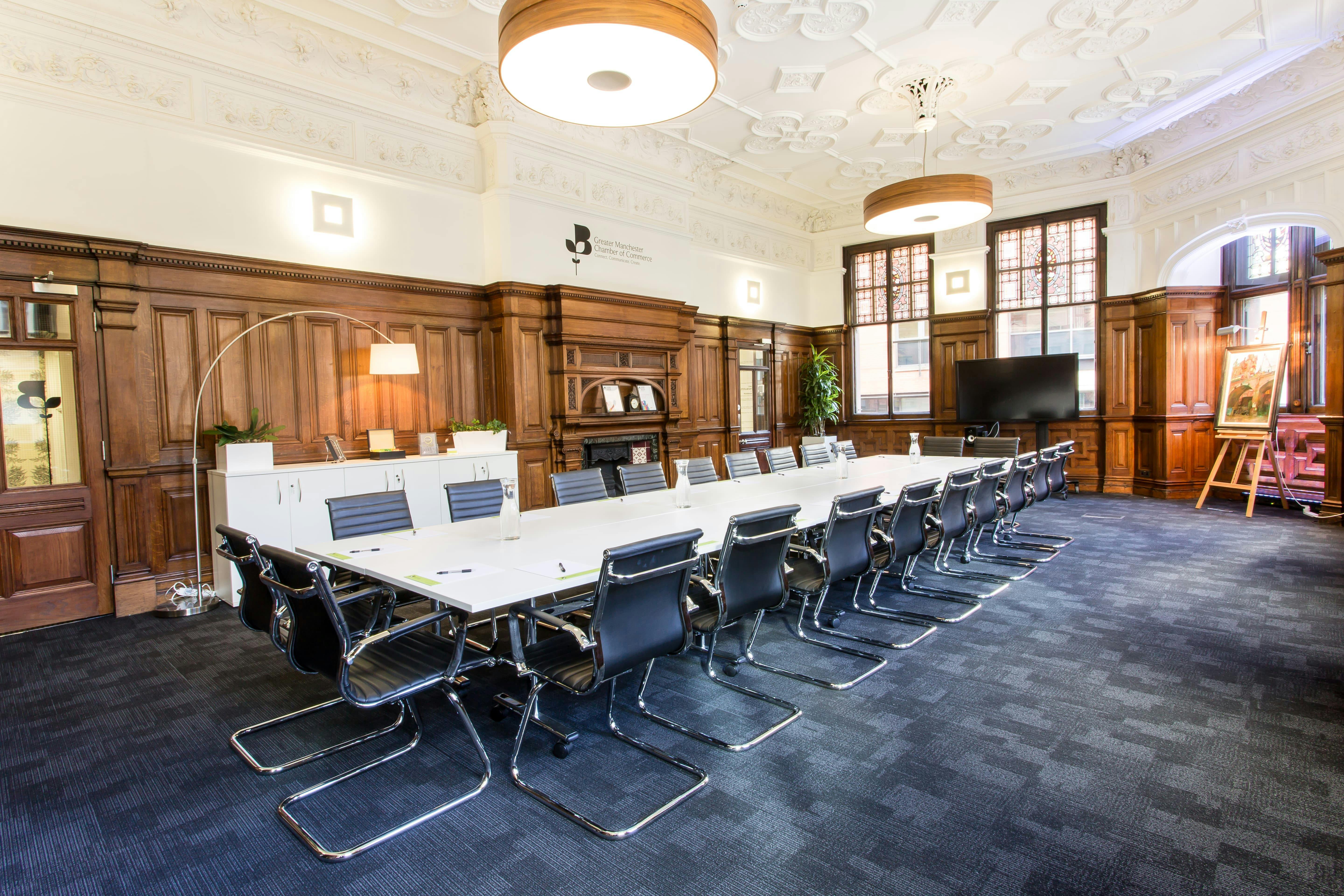 Board Room in Chamber Space with sleek table, ideal for professional meetings and presentations.