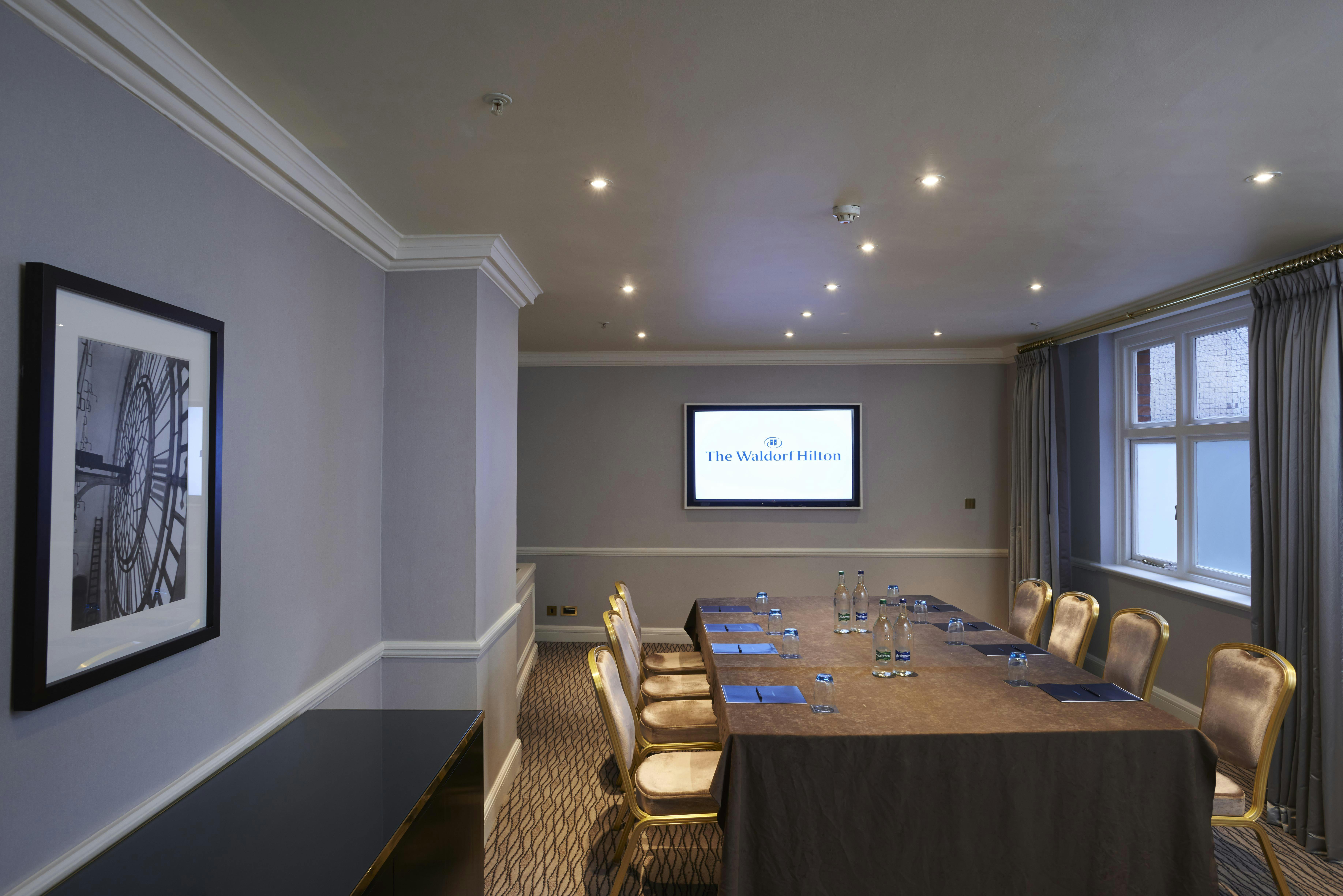 Modern meeting room at The Waldorf Hilton, London, perfect for professional events.