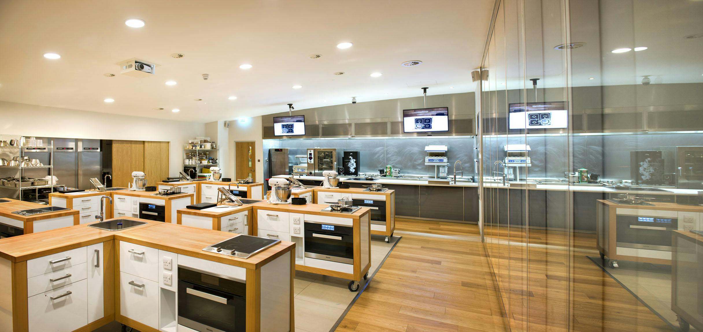 Modern culinary kitchen at SpitfireHouse for interactive cooking classes and events.