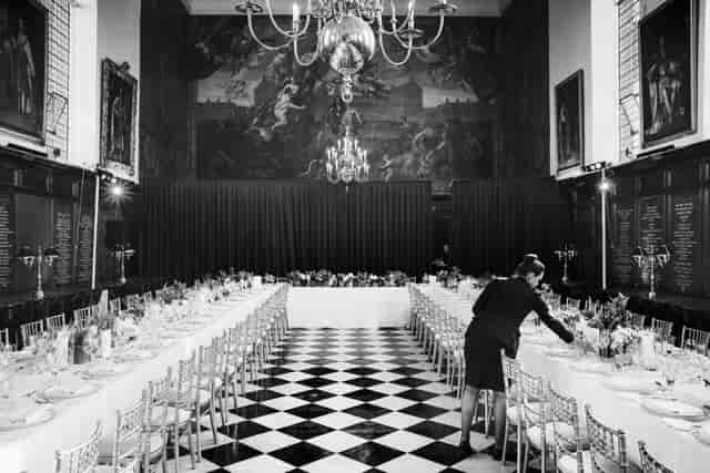 Elegant banquet setup in The Great Hall, Royal Hospital Chelsea for a formal dinner event.