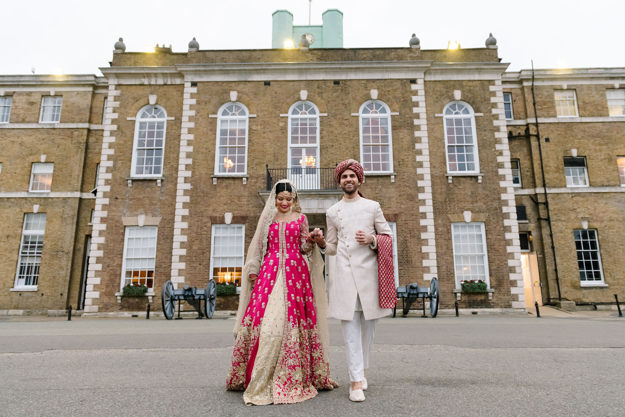 Couple in elegant wedding attire at Artillery Garden, classic venue for sophisticated ceremonies. - Banner